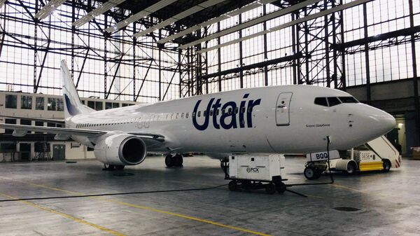 Самолет Boeing 737-800 авиакомпании Utair в новой ливрее в ангаре аэропорта Внуково. 31 октября 2017 Самолет Boeing 737-800 авиакомпании Utair в новой ливрее в ангаре аэропорта Внуково. 31 октября 2017