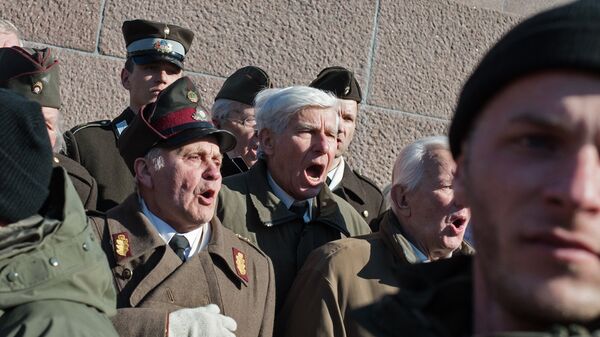 Шествие участников легиона Ваффен СС в Риге Шествие участников легиона Ваффен СС в Риге