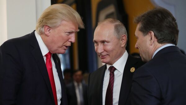 Президент США Дональд Трамп и президент РФ Владимир Путин. Архивное фото Президент США Дональд Трамп и президент РФ Владимир Путин. Архивное фото