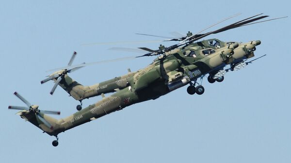 Вертолеты Ми-28 над полигоном Кадамовский в Ростовской области. Архивное фото Вертолеты Ми-28 над полигоном Кадамовский в Ростовской области. Архивное фото