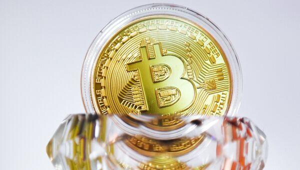 Криптовалюта биткойн. Архивное фото Криптовалюта биткойн. Архивное фото