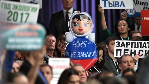 Журналисты на ежегодной большой пресс-конференции президента РФ Владимира Путина Журналисты на ежегодной большой пресс-конференции президента РФ Владимира Путина