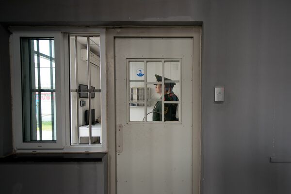 Охрана в Центре для заключенных в Пекине Охрана в Центре для заключенных в Пекине
