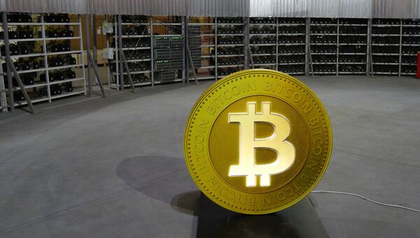 Криптовалюта биткоин. Архивное фото Криптовалюта биткоин. Архивное фото