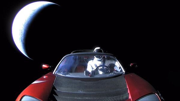 Кабриолет Tesla Roadster, выведенный на орбиту ракетой-носителем Falcon Heavy американской компании SpaceX Кабриолет Tesla Roadster, выведенный на орбиту ракетой-носителем Falcon Heavy американской компании SpaceX