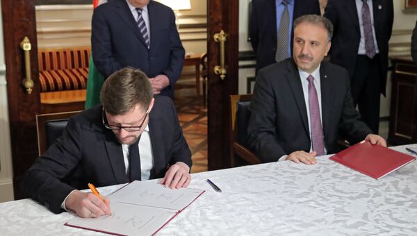 Первый заместитель главного редактора МИА Россия сегодня Сергей Кочетков и руководитель официального палестинского информационного агентства WAFA министр Ахмад Ассаф на церемонии подписания соглашения о сотрудничестве МИА Россия сегодня c палестинским информагентством WAFA. 13 февраля 2018 Первый заместитель главного редактора МИА Россия сегодня Сергей Кочетков и руководитель официального палестинского информационного агентства WAFA министр Ахмад Ассаф на церемонии подписания соглашения о сотрудничестве МИА Россия сегодня c палестинским информагентством WAFA. 13 февраля 2018