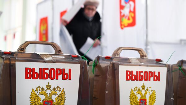 Урны на выборах президента РФ на избирательном участке №13-06 в Москве. 18 марта 2018 Урны на выборах президента РФ на избирательном участке №13-06 в Москве. 18 марта 2018