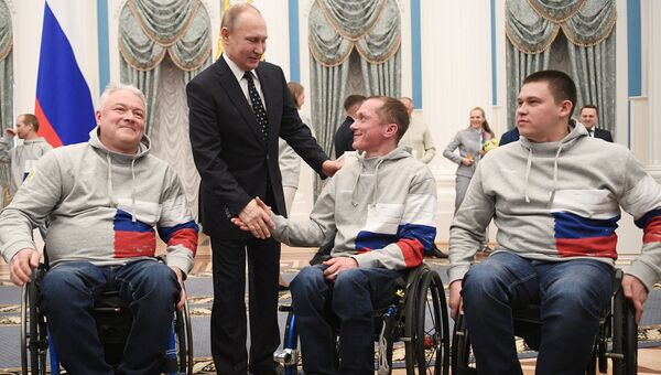 Президент РФ Владимир Путин во время встречи с российскими спортсменами – победителями и призёрами XII Паралимпийских зимних игр в Пхёнчхане. 20 марта 2018 Президент РФ Владимир Путин во время встречи с российскими спортсменами – победителями и призёрами XII Паралимпийских зимних игр в Пхёнчхане. 20 марта 2018