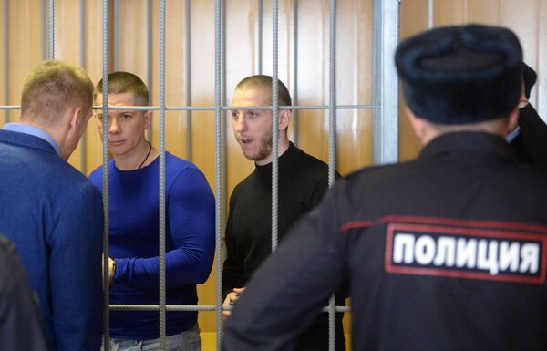 Участники преступной группировки, организатором которой является Захарий Калашов, во время оглашения приговора в Никулинском суде. 29 марта 2018 Участники преступной группировки, организатором которой является Захарий Калашов, во время оглашения приговора в Никулинском суде. 29 марта 2018