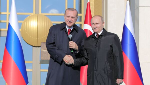 Президент РФ Владимир Путин и президент Турецкой Республики Реджеп Тайип Эрдоган на церемонии запуска строительства первого энергоблока атомной электростанции (АЭС) Аккую в Турции Президент РФ Владимир Путин и президент Турецкой Республики Реджеп Тайип Эрдоган на церемонии запуска строительства первого энергоблока атомной электростанции (АЭС) Аккую в Турции