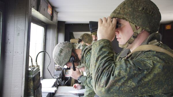 Военнослужащие во время учений Народной милиции ЛНР по огневой подготовке. Архивное фото Военнослужащие во время учений Народной милиции ЛНР по огневой подготовке. Архивное фото
