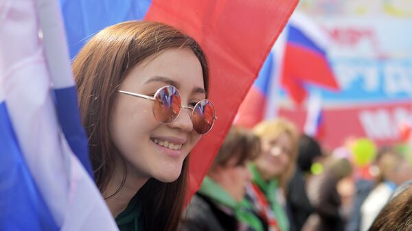 Участники первомайской демонстрации на Красной площади в Москве Участники первомайской демонстрации на Красной площади в Москве