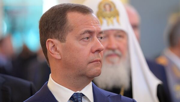 Председатель правительства РФ Дмитрий Медведев на церемонии инаугурации президента РФ Владимира Путина в Кремле. 7 мая 2018 Председатель правительства РФ Дмитрий Медведев на церемонии инаугурации президента РФ Владимира Путина в Кремле. 7 мая 2018