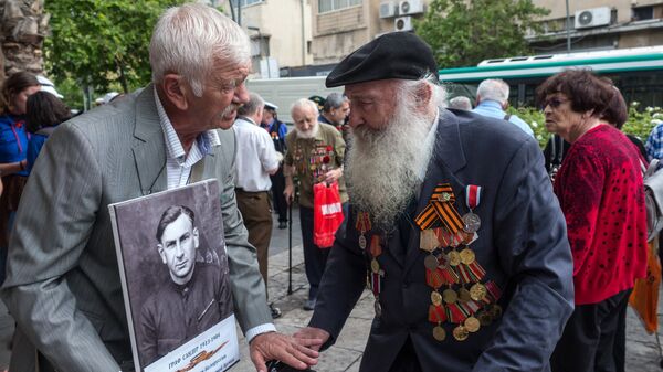 Участники шествия ветеранов ВОВ и акции Бессмертный полк в Хайфе, Израиль Участники шествия ветеранов ВОВ и акции Бессмертный полк в Хайфе, Израиль