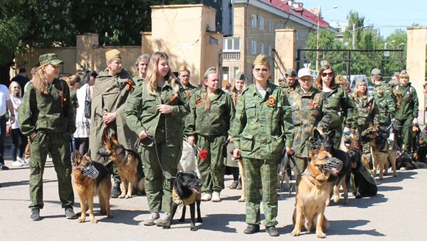 Участники акции, посвященной собакам, принимавшим участие в Великой Отечественной войне, в Калининграде. 9 мая 2018 Участники акции, посвященной собакам, принимавшим участие в Великой Отечественной войне, в Калининграде. 9 мая 2018