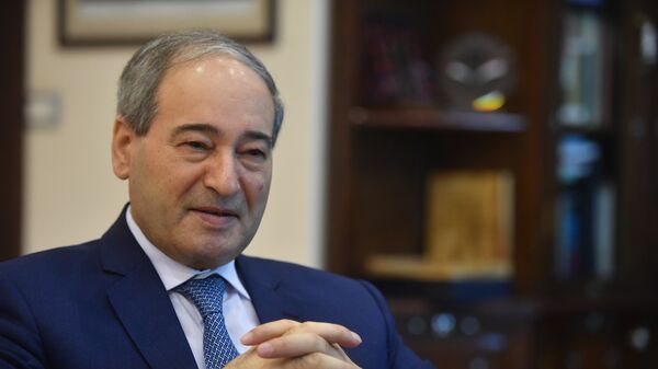 Замглавы МИД Сирии Фейсал Микдад во время интервью с корреспондентами РИА Новости. 22 мая 2018 Замглавы МИД Сирии Фейсал Микдад во время интервью с корреспондентами РИА Новости. 22 мая 2018