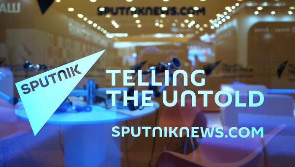 Стенд международного информационного агентства и радио Sputnik в конгрессно-выставочном центре Экспофорум накануне открытия Санкт-Петербургского международного экономического форума Стенд международного информационного агентства и радио Sputnik в конгрессно-выставочном центре Экспофорум накануне открытия Санкт-Петербургского международного экономического форума