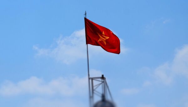 Флаг Вьетнама. Архивное фото Флаг Вьетнама. Архивное фото
