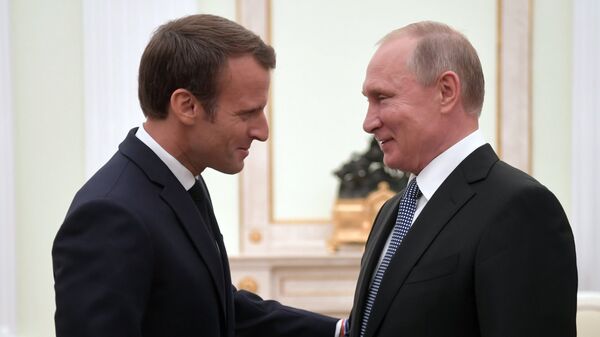 Владимир Путин и президент Франции Эммануэль Макрон Владимир Путин и президент Франции Эммануэль Макрон