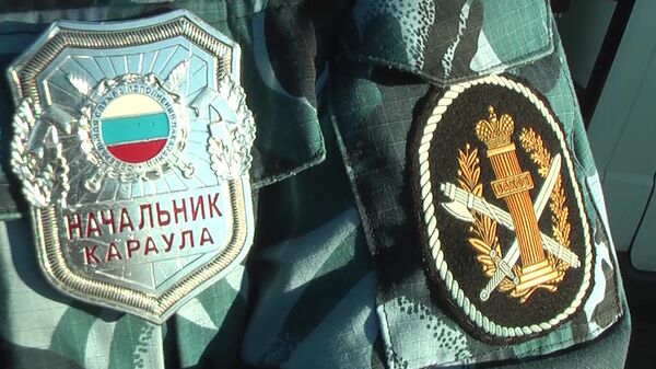 Значок и нашивка на форме сотрудника ФСИН Значок и нашивка на форме сотрудника ФСИН
