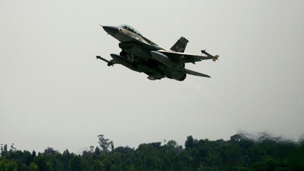 Израильский истребитель F-16. Архивное фото Израильский истребитель F-16. Архивное фото