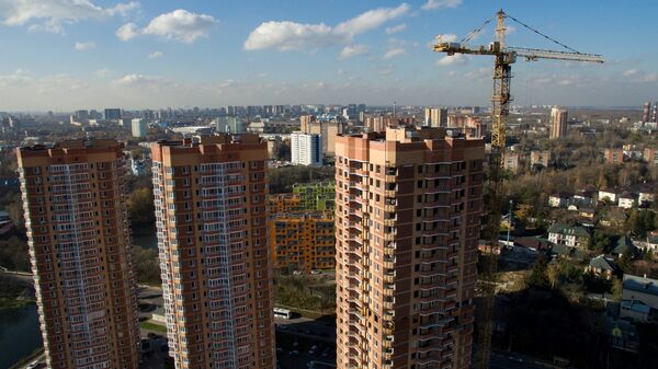 Строительство жилых домов на Ленинском проспекте в городе Химки в Подмосковье. Архивное фото Строительство жилых домов на Ленинском проспекте в городе Химки в Подмосковье. Архивное фото