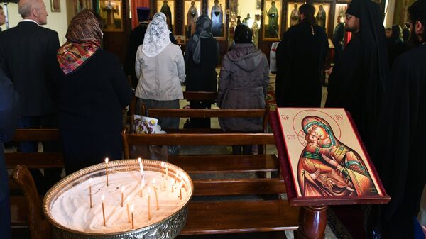 Прихожане на торжественной литургии в храме, освященном в честь священномученика Игнатия Анхтиохийского Богоносца, в Дамаске. 18 ноября 2018 Прихожане на торжественной литургии в храме, освященном в честь священномученика Игнатия Анхтиохийского Богоносца, в Дамаске. 18 ноября 2018