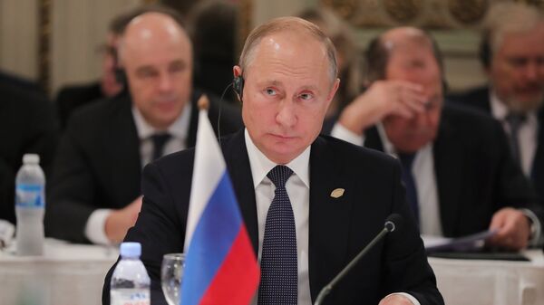 Президент РФ Владимир Путин во время встречи лидеров БРИКС на полях саммита Группы двадцати в Буэнос-Айресе. 30 ноября 2018 Президент РФ Владимир Путин во время встречи лидеров БРИКС на полях саммита Группы двадцати в Буэнос-Айресе. 30 ноября 2018