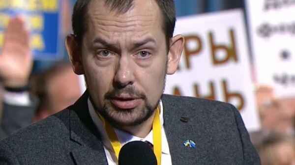 Украинский журналист Роман Цимбалюк на ежегодной большой пресс-конференции президента РФ Владимира Путина Украинский журналист Роман Цимбалюк на ежегодной большой пресс-конференции президента РФ Владимира Путина