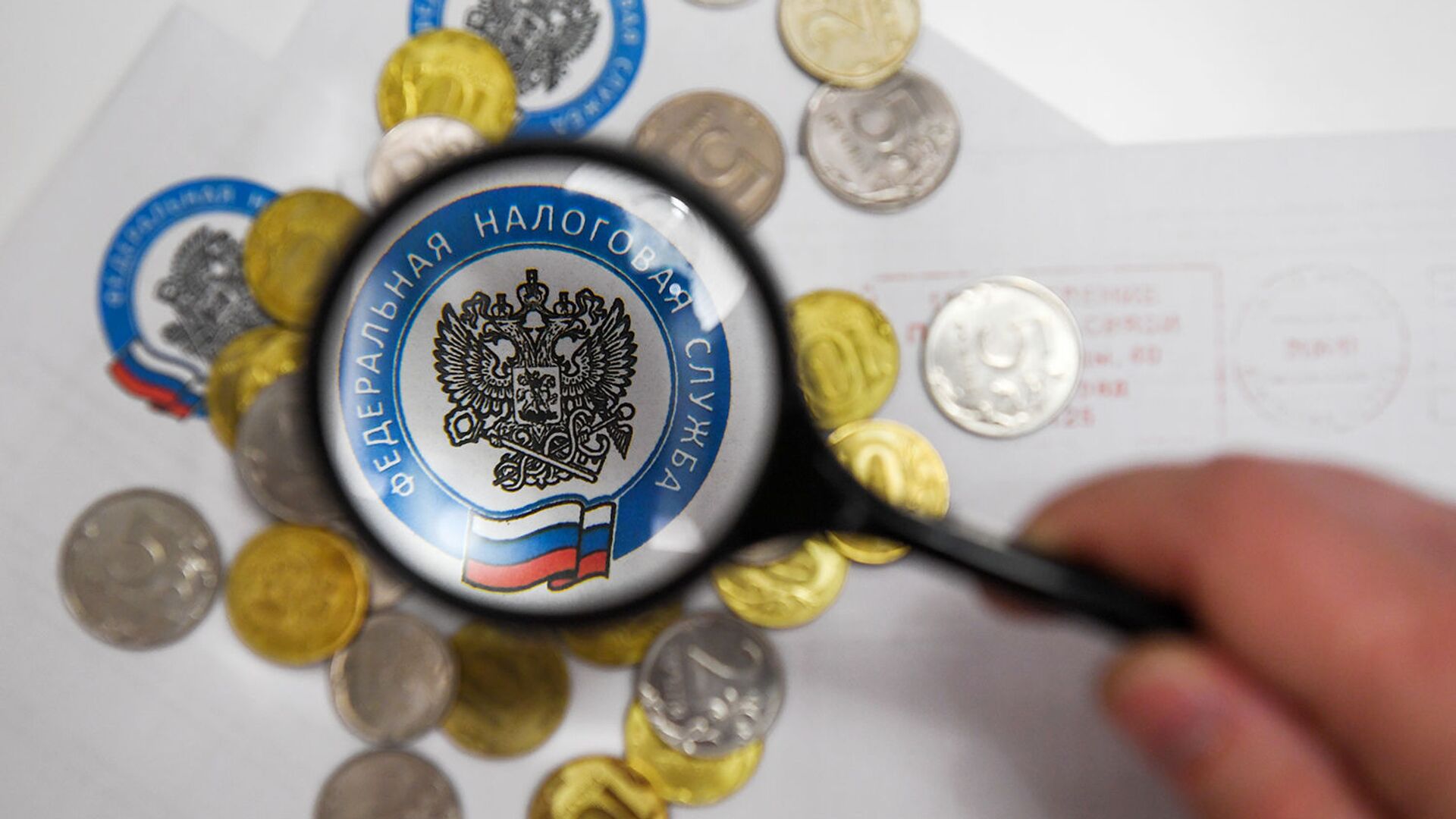 Монеты России и конверты с логотипом ФНС РФ Монеты России и конверты с логотипом ФНС РФ - РИА Новости, 1920, 06.11.2020