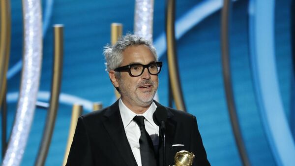 Мексиканский режиссер Альфонсо Куарон на церемонии вручении премии Золотой глобус