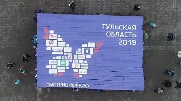 Бабочка и волонтеры: флешмоб в честь перехода на цифру прошел в регионах Бабочка и волонтеры: флешмоб в честь перехода на цифру прошел в регионах