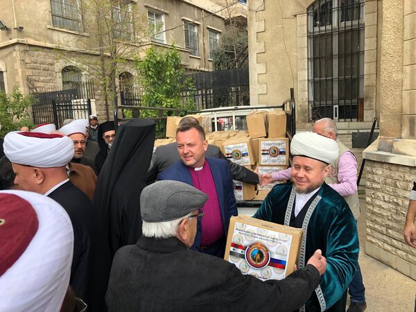 В Дамаске российские христиане и мусульмане раздали гумпомощь нуждающимся В Дамаске российские христиане и мусульмане раздали гумпомощь нуждающимся