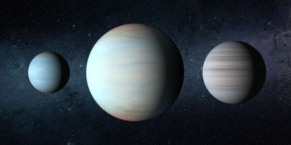 Третья планета (в центре), открытая в уникальной звездной системе Kepler-47 Третья планета (в центре), открытая в уникальной звездной системе Kepler-47