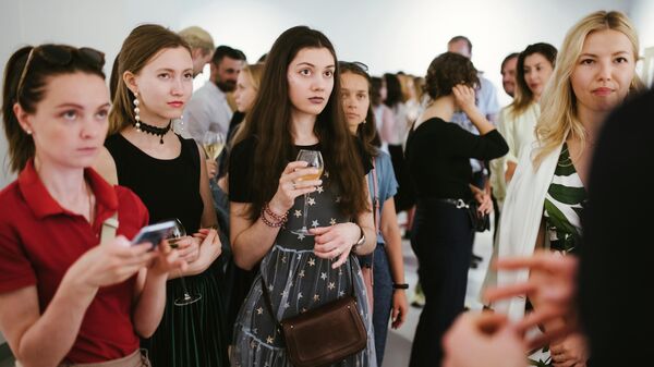 Гости слушают лекцию Гости слушают лекцию