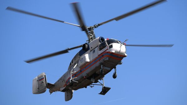Вертолет Ка-32А Московского авиационного центра во время учений Вертолет Ка-32А Московского авиационного центра во время учений