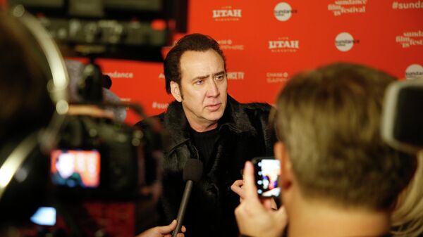 Актер Николас Кейдж дает интервью на премьере фильма Мэнди во время кинофестиваля Сандэнс в Парк-Сити, штат Юта Актер Николас Кейдж дает интервью на премьере фильма Мэнди во время кинофестиваля Сандэнс в Парк-Сити, штат Юта