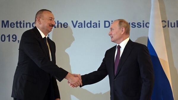 Владимир Путин и президент Азербайджана Ильхам Алиев во время встречи Владимир Путин и президент Азербайджана Ильхам Алиев во время встречи