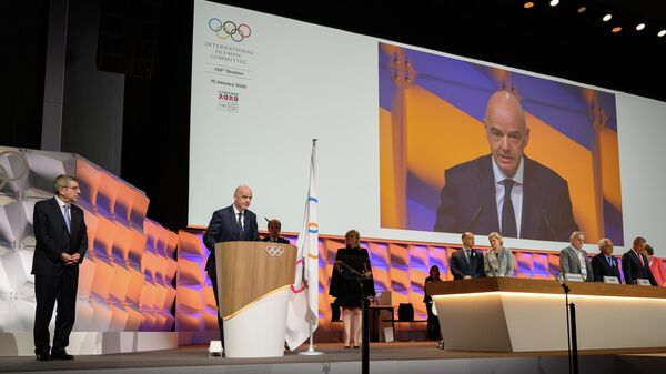 FIFA President Gianni Infantino takes the oath after being elected as International Olympic Committee (IOC) member during an Olympic session in Lausanne on January 10, 2020. (Photo by FABRICE COFFRINI / AFP)
