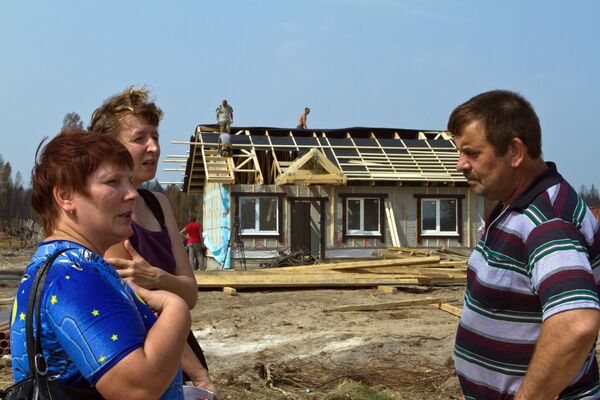 Начало работ по строительству новых домов для пострадавших от лесных пожаров. Архив Начало работ по строительству новых домов для пострадавших от лесных пожаров. Архив
