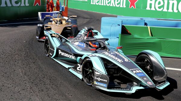 FILE PHOTO: Motor racing - Formula E - Santiago ePrix - Santiago, Chile - January 26, 2019 Panasonic Jaguar's Mitch Evans and DS Techeetah's Andre Lotterer in action during the race REUTERS/Rodrigo Garrido/File Photo FILE PHOTO: Motor racing - Formula E - Santiago ePrix - Santiago, Chile - January 26, 2019 Panasonic Jaguar's Mitch Evans and DS Techeetah's Andre Lotterer in action during the race REUTERS/Rodrigo Garrido/File Photo