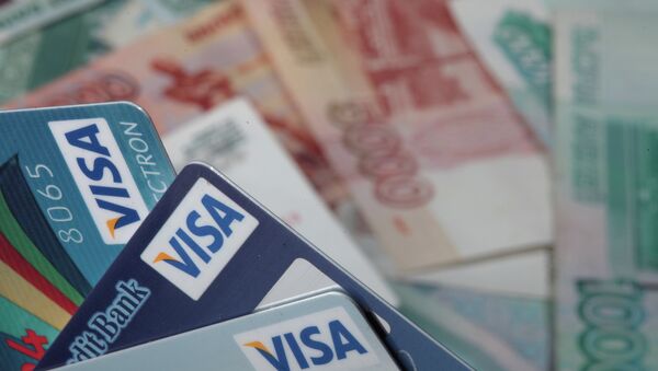 Пластиковые карты Visa. Архивное фото Пластиковые карты Visa. Архивное фото