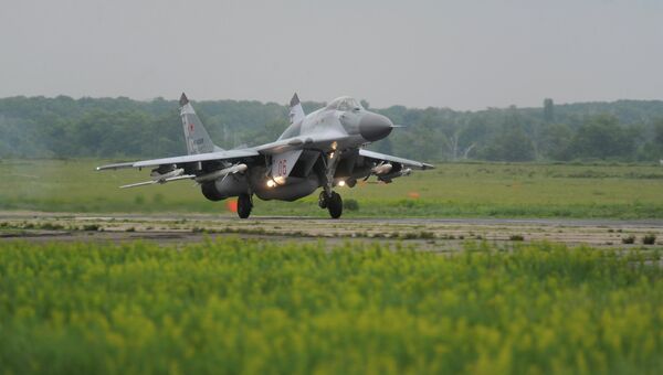 Истребитель МиГ-29 СМТ во время учений по проверке боеготовности. Архивное фото Истребитель МиГ-29 СМТ во время учений по проверке боеготовности. Архивное фото