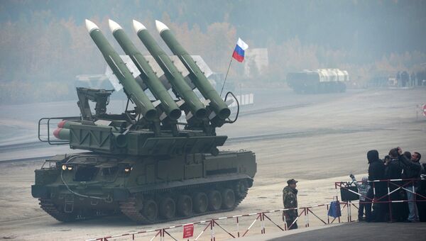 Зенитный ракетный комплекс Бук-М1 на выставке RAE-2013. Архивное фото Зенитный ракетный комплекс Бук-М1 на выставке RAE-2013. Архивное фото