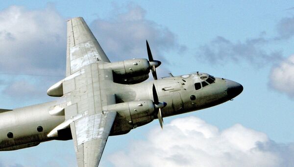 Военно-транспортный самолет Ан-26. Архивное фото Военно-транспортный самолет Ан-26. Архивное фото