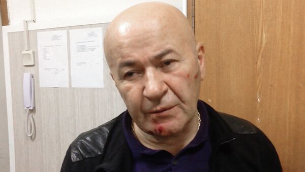 Резо Бухникашвили в отделении полиции после задержания за разбойное нападение на квартиру в центре Москвы. Фото с места события Резо Бухникашвили в отделении полиции после задержания за разбойное нападение на квартиру в центре Москвы. Фото с места события