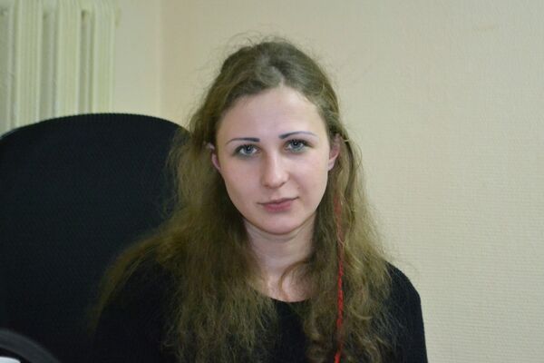 Участница группы Pussy Riot Мария Алехина в офисе общественной организации Комитет против пыток Участница группы Pussy Riot Мария Алехина в офисе общественной организации Комитет против пыток