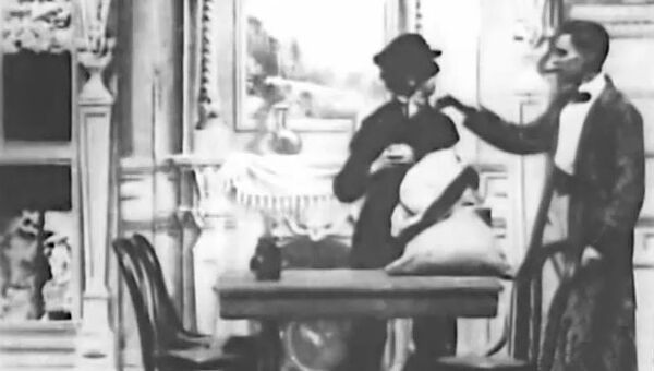Кадр из фильма Озадаченный Шерлок Холмс, 1900 год Кадр из фильма Озадаченный Шерлок Холмс, 1900 год