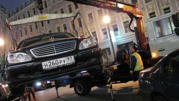 Эвакуация автомобиля в Москве. Архивное фото Эвакуация автомобиля в Москве. Архивное фото
