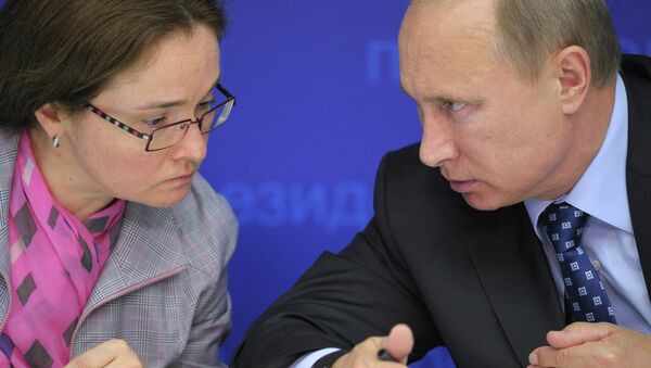 Владимир Путин и Эльвира Набиуллина. Архивное фото Владимир Путин и Эльвира Набиуллина. Архивное фото